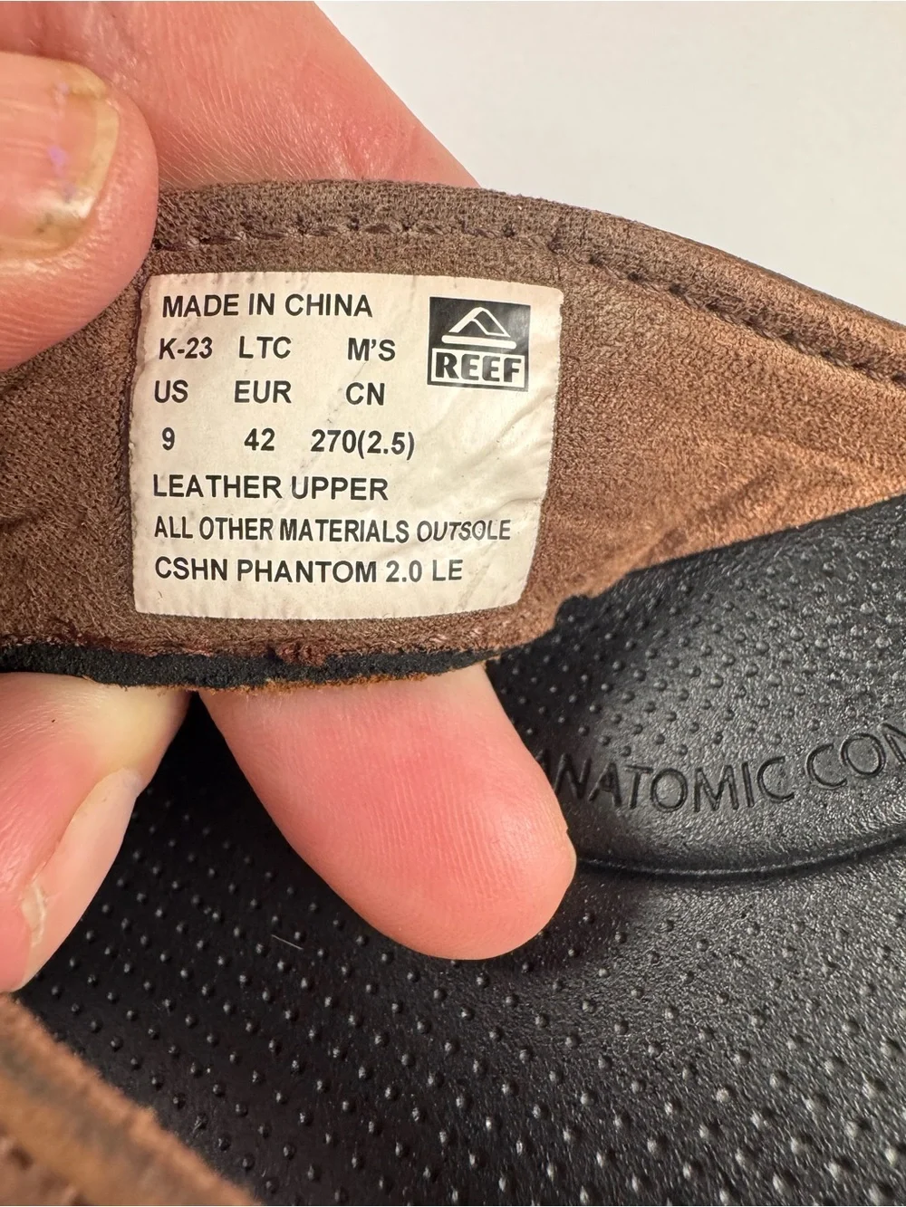Reef Men's Brown and Black Leather-Style Flip Flops